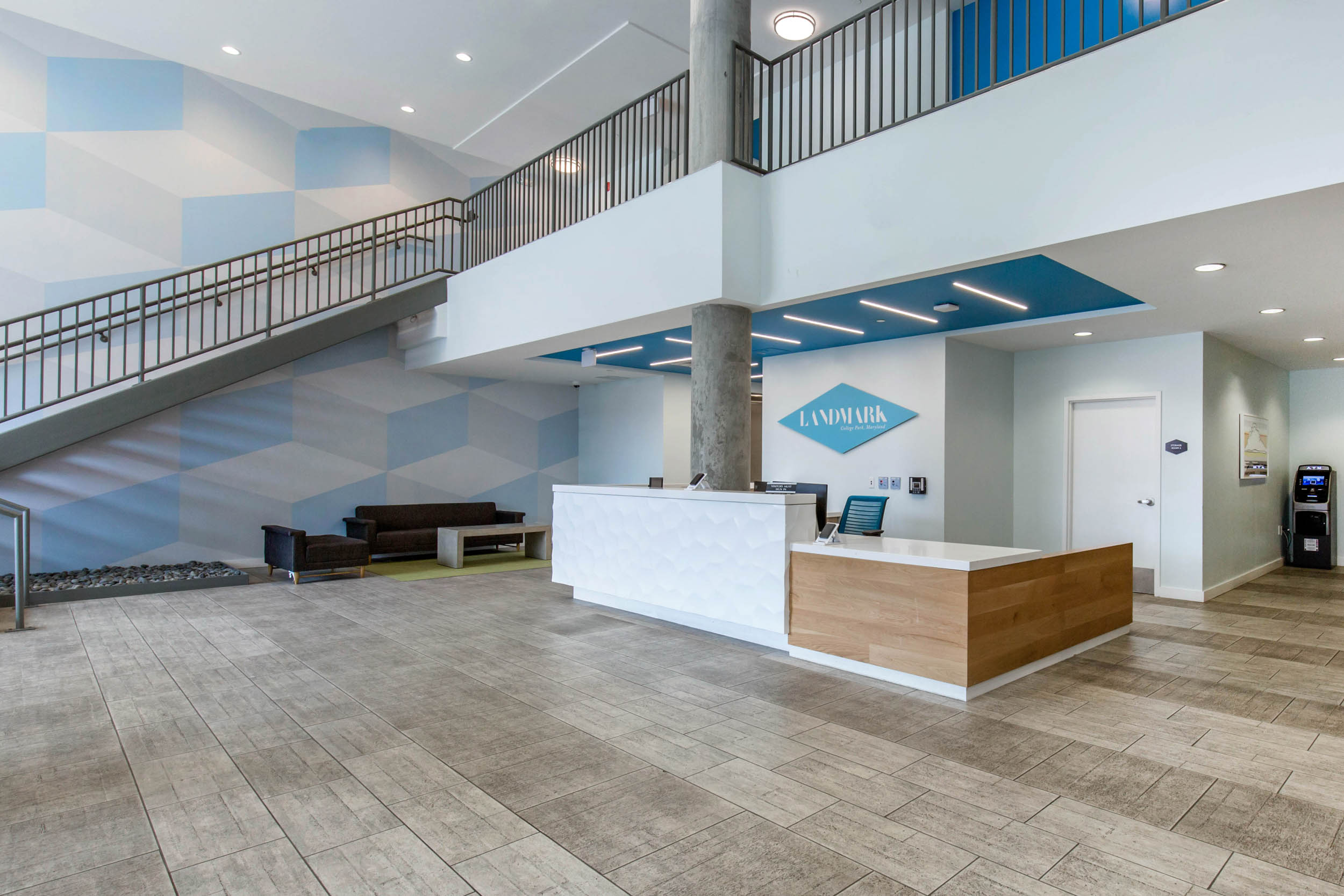 Lobby with welcome desk and stairway